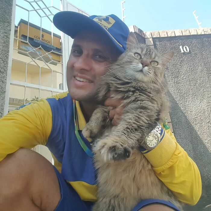 Antunes: O carteiro que está transformando cães em seus melhores amigos (32 fotos) 18